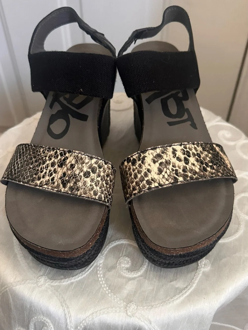 OTBT Black Elastic Wedge Sandals with Metallic Snake-Print Strap